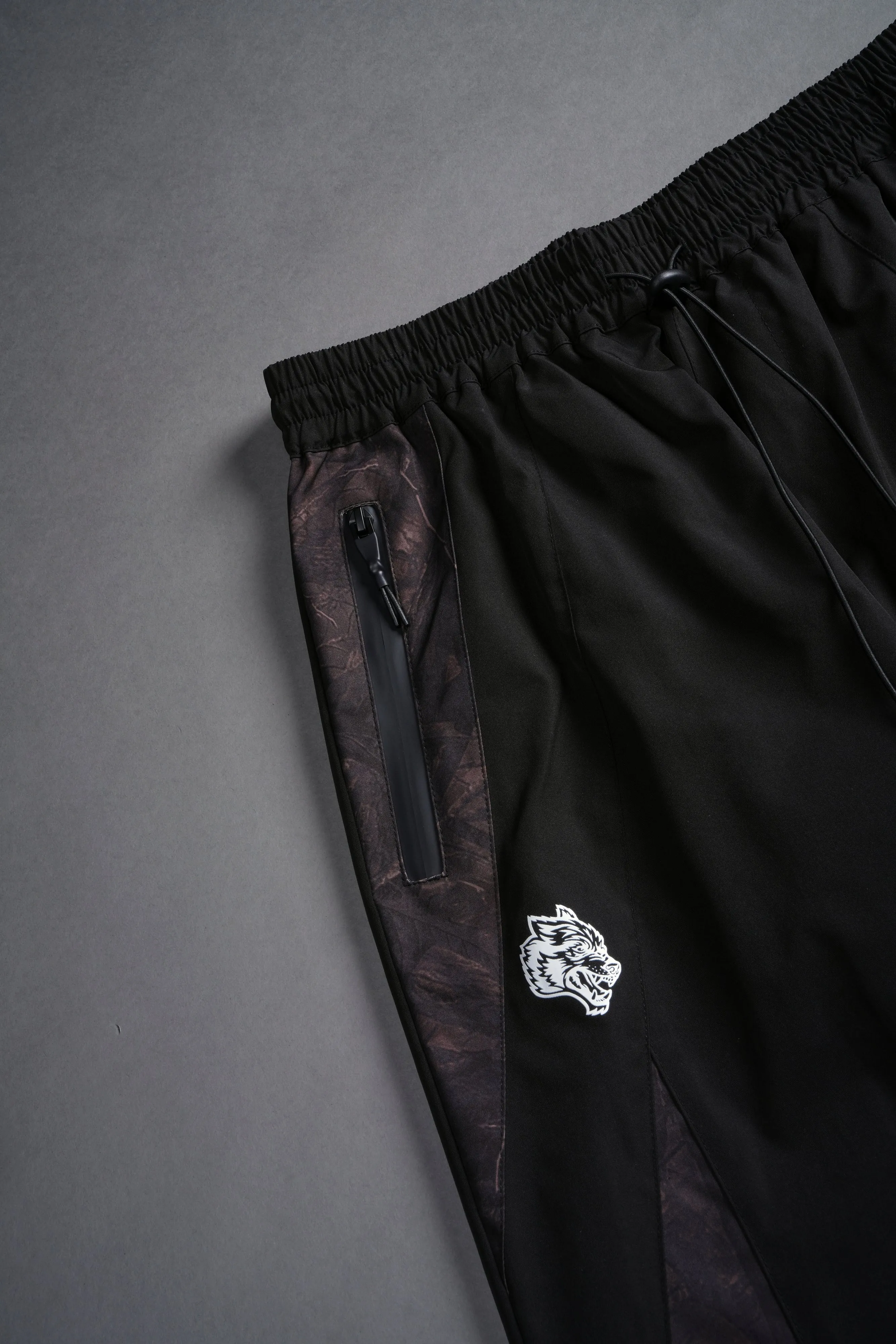 Dual Brolic Unisex Track Pants in Black Driftwood Forest Camo